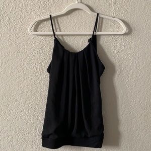 Express black, sleeveless top.